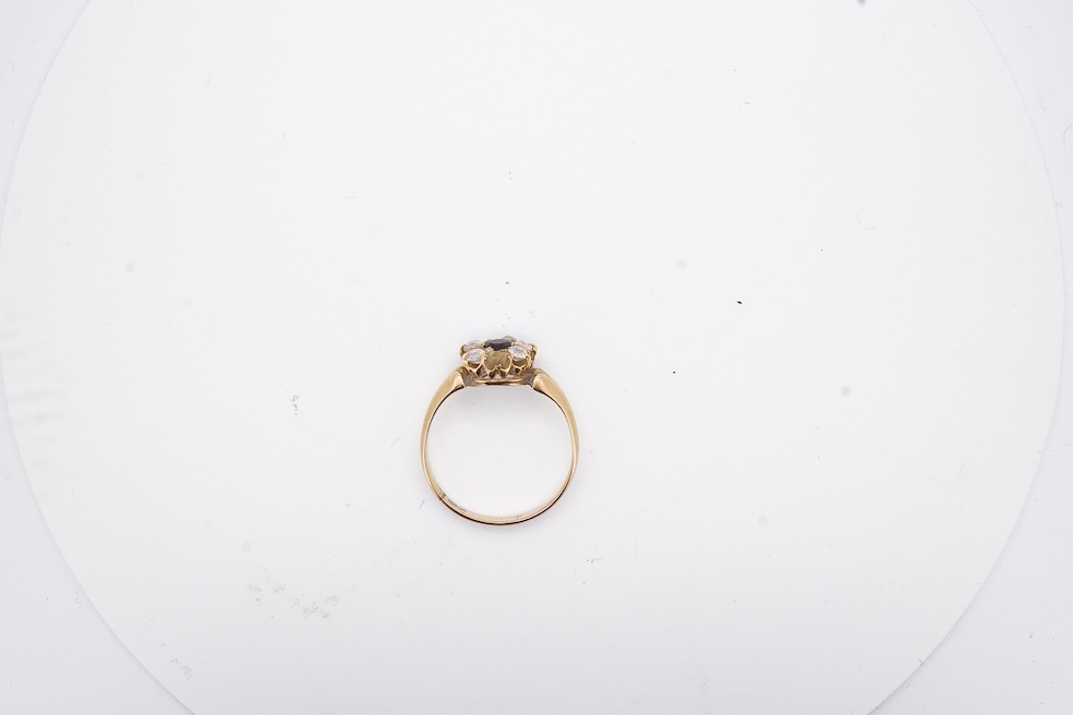 A yellow metal, garnet? and diamond set circular cluster ring (one stone missing), size P, gross weight 3 grams. Condition - poor